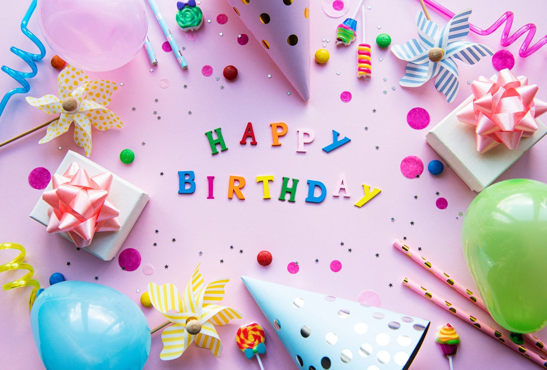 Happy birthday wooden text with birthday party decor