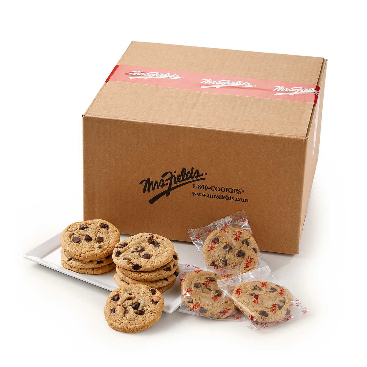 Mrs. Field's chocolate chip cookies displayed on a white plate and individually wrapped in clear bags, with the brand's brown cardboard box in the background.