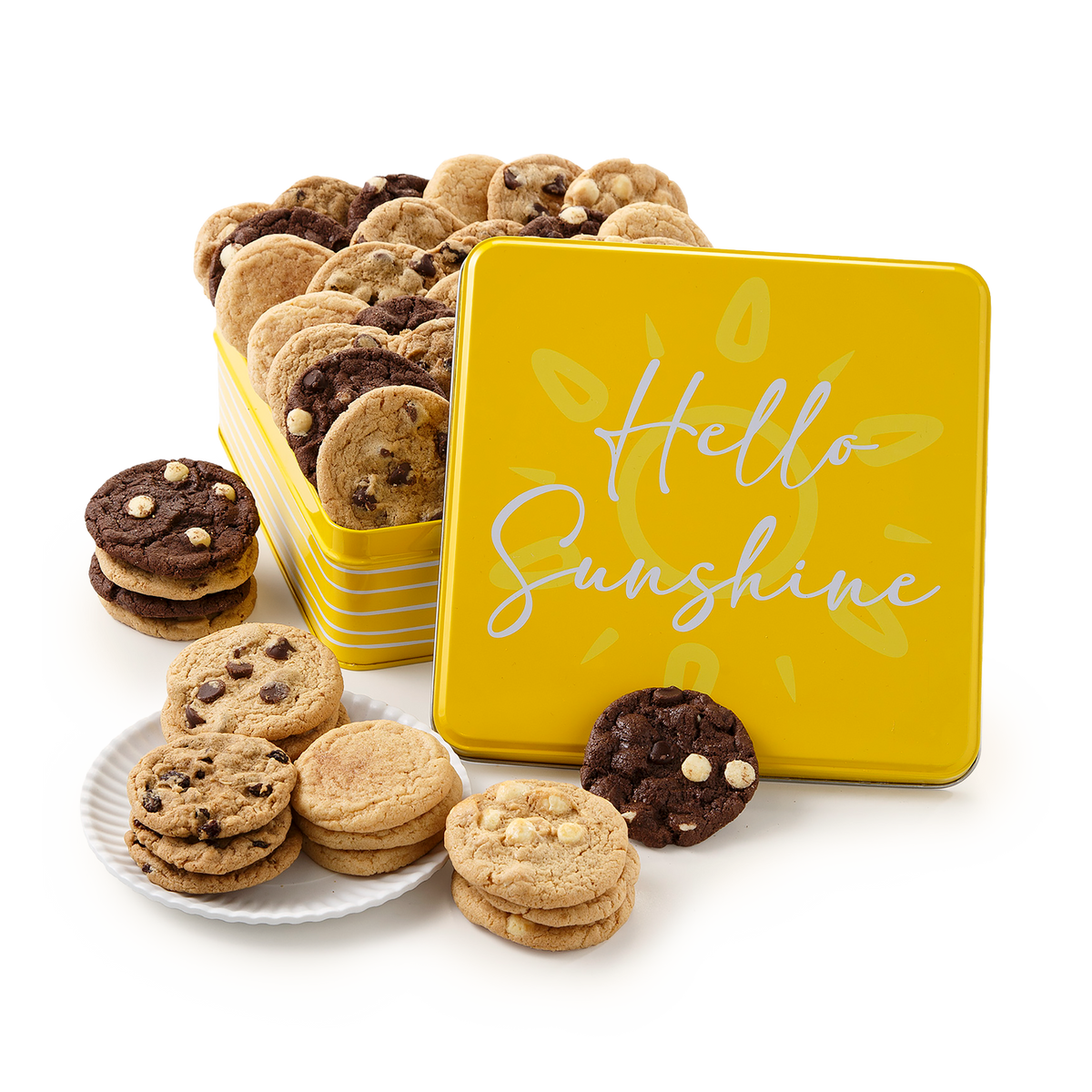 A stack of round yellow cookie tin cookies with chocolate chip and oatmeal cookies displayed on a white plate and around a bright yellow square tin lid that reads 'Hello Sunshine' in white script. The cookies and yellow tins are arranged on a clean white background.