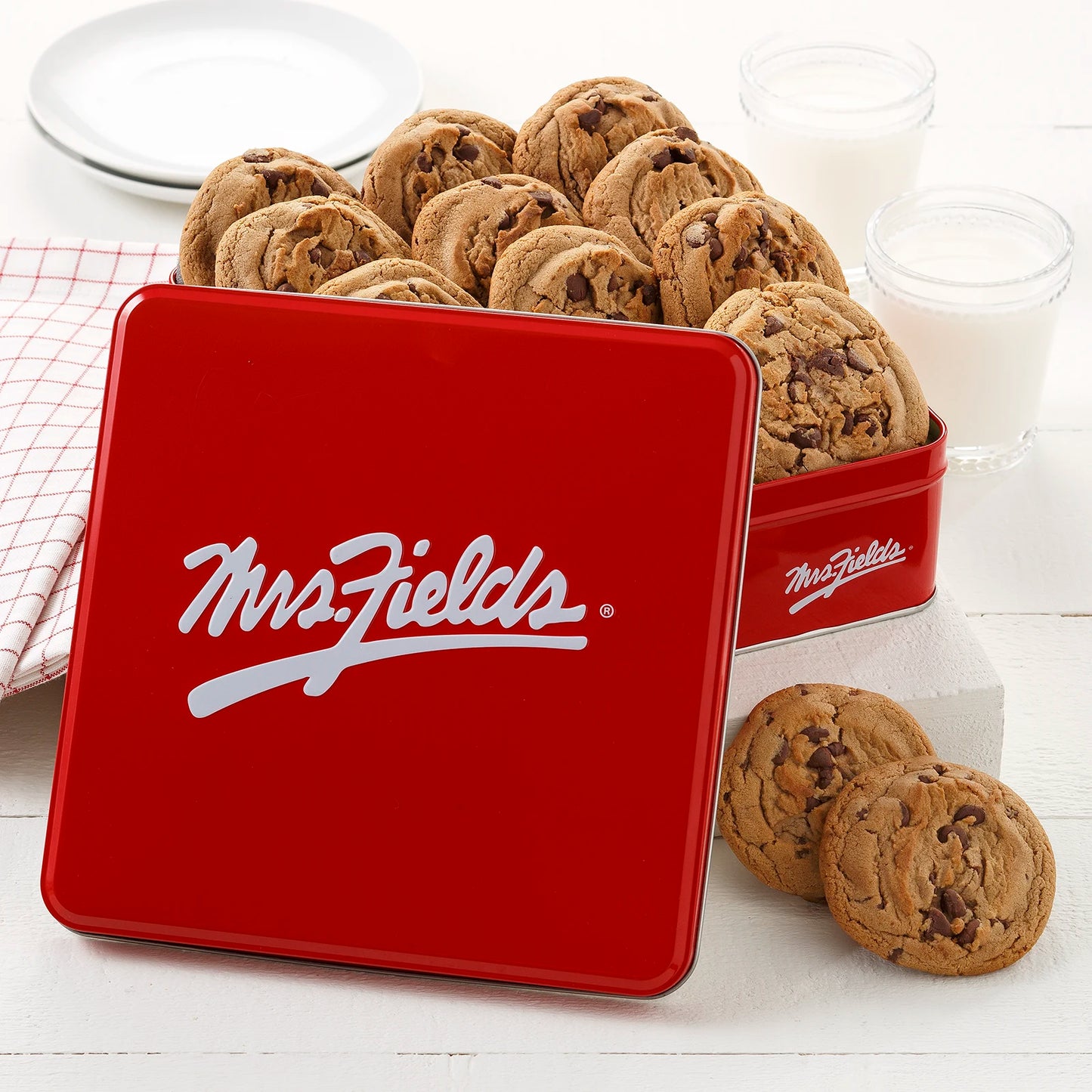 Mrs. Fields Red Signature tin filled with semi-sweet chocolate chip cookies