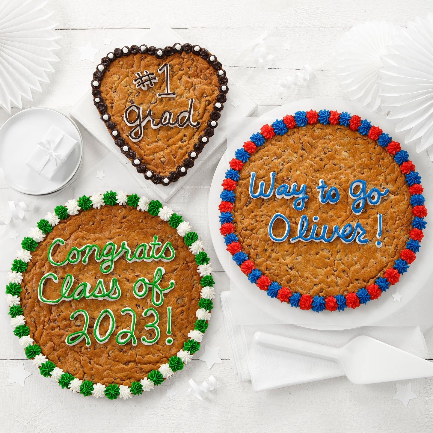 Three custom cookie cakes
