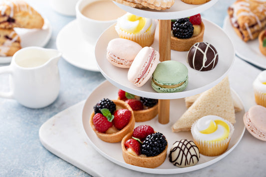 A tiered tray featuring different types of desserts 