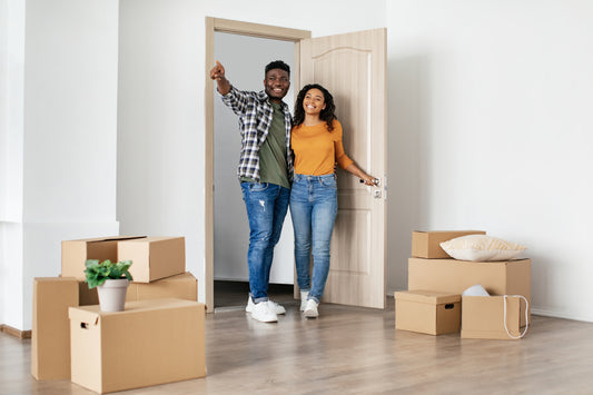 couple-entering-their-new-home-before-housewarming-party
