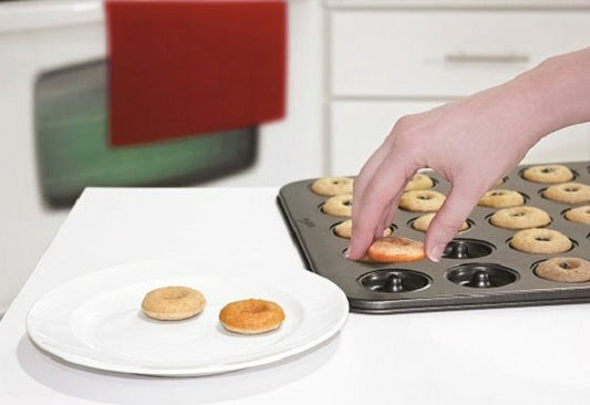 Pulling treat from donut tray