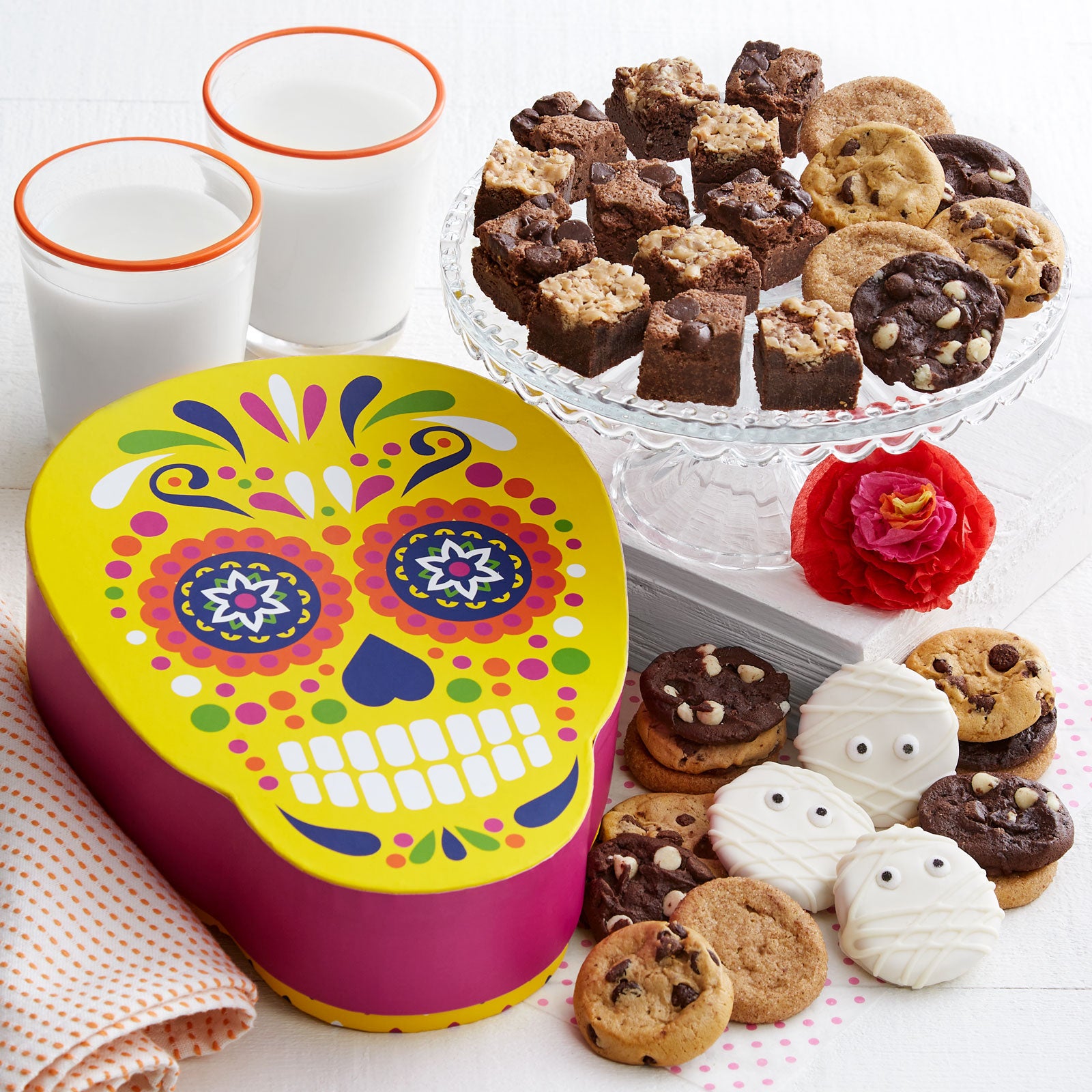 Halloween skull shaped gift box with an assortment of brownie bites, Nibblers®, and mummy frosted Nibblers®