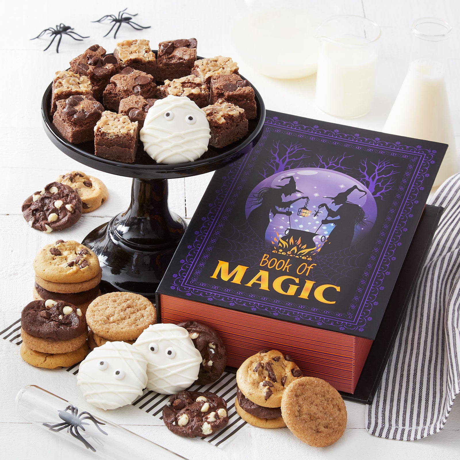 Halloween Book of Magic box with an assortment of brownie bites, Nibblers®, and Mummy Nibblers®