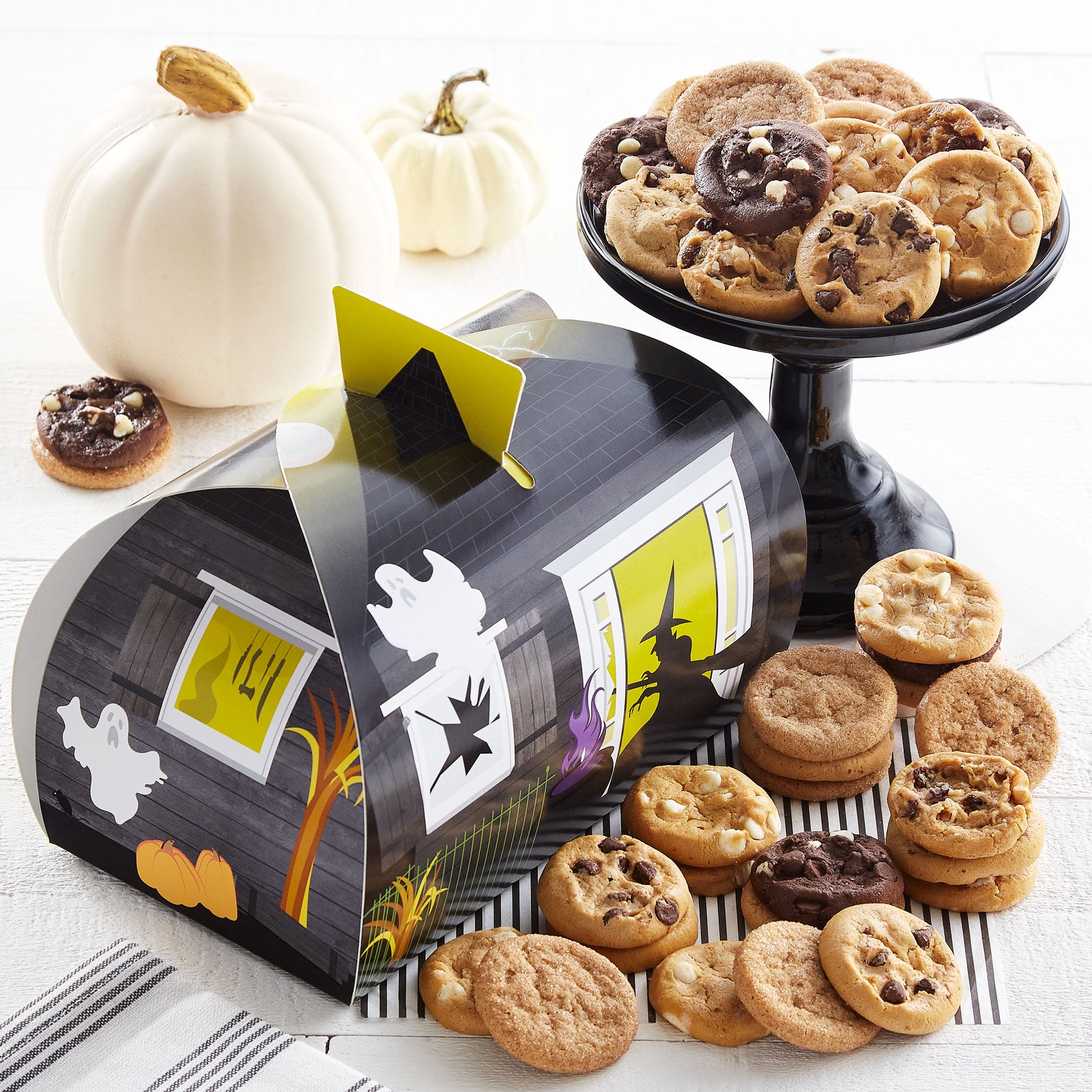 Halloween themed box carrier with an assortment of Nibblers® on the side