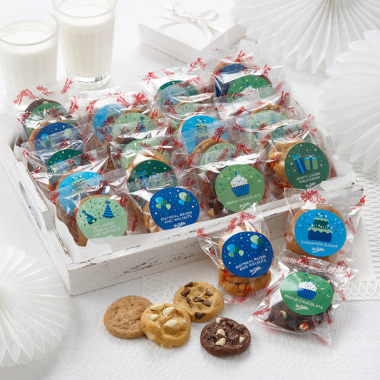 An assortment of packaged nibblers with birthday themed stickers on each package