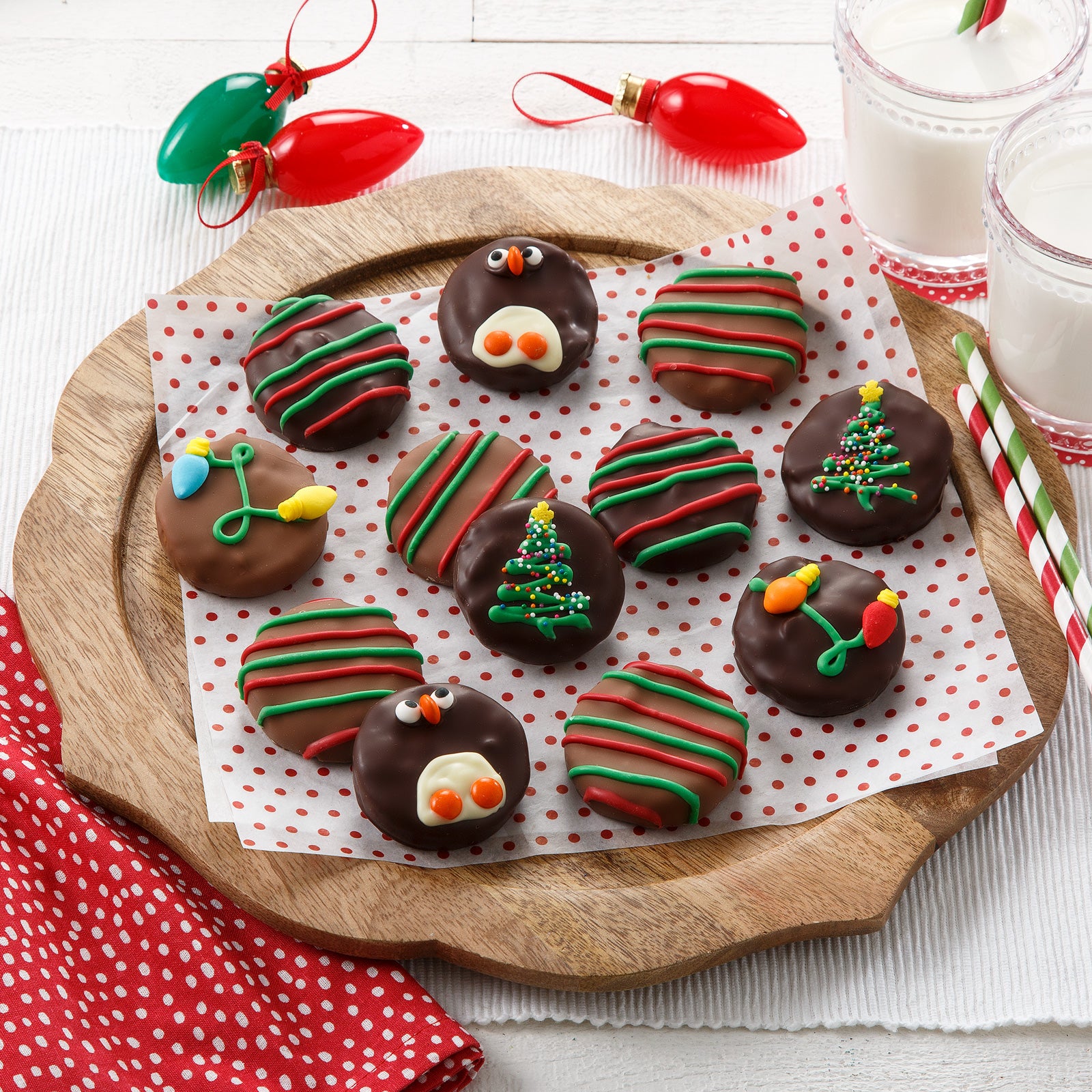 Twelve holiday-decorated chocolate-covered Nibblers®
