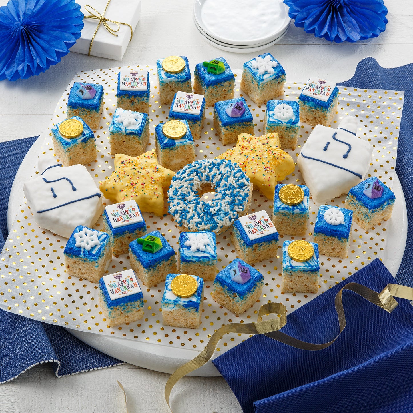 An assortment of different shaped Hanukkah-decorated rice krispies