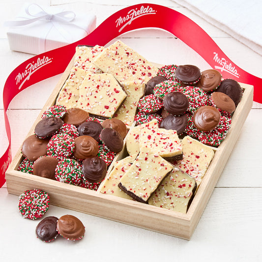 Peppermint chocolate bark and round pieces of an assortment of chocolate.