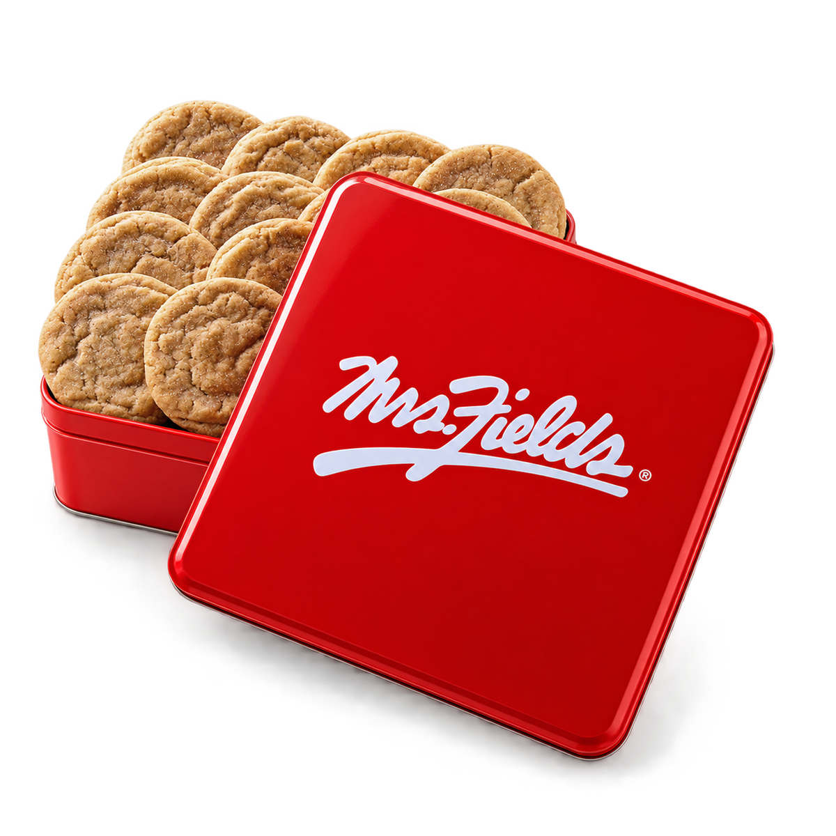 A red square metal tin filled with round cookies, with the lid leaning in front and showing the white Mrs. Fields logo.