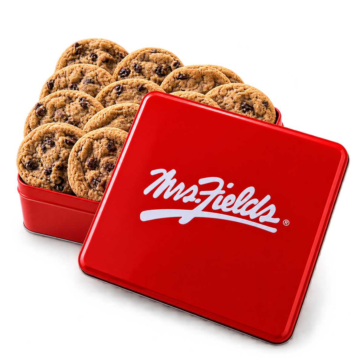 A red metal cookie tin filled with chocolate chip cookies, with the lid leaning in front and showing the white Mrs. Fields logo, on a white background.