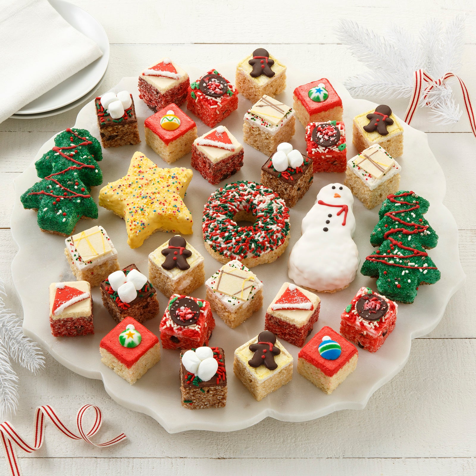 An assortment of different-shaped holiday-themed rice krispie treats