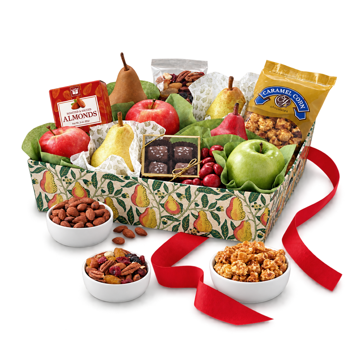 A gourmet gift basket filled with fresh fruits, nuts, chocolates, and packaged snacks, arranged in a patterned box with a red ribbon on a white background.