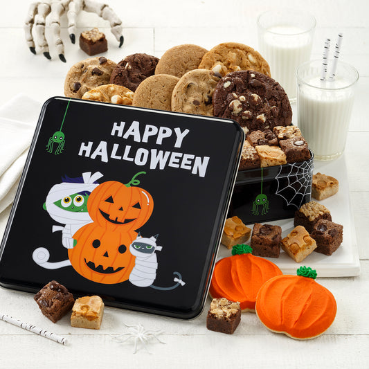 A black halloween themed gift tin with a happy halloween sentiment filled with an assortment of original cookies, brownie bites, and two frosted pumpkin cookies
