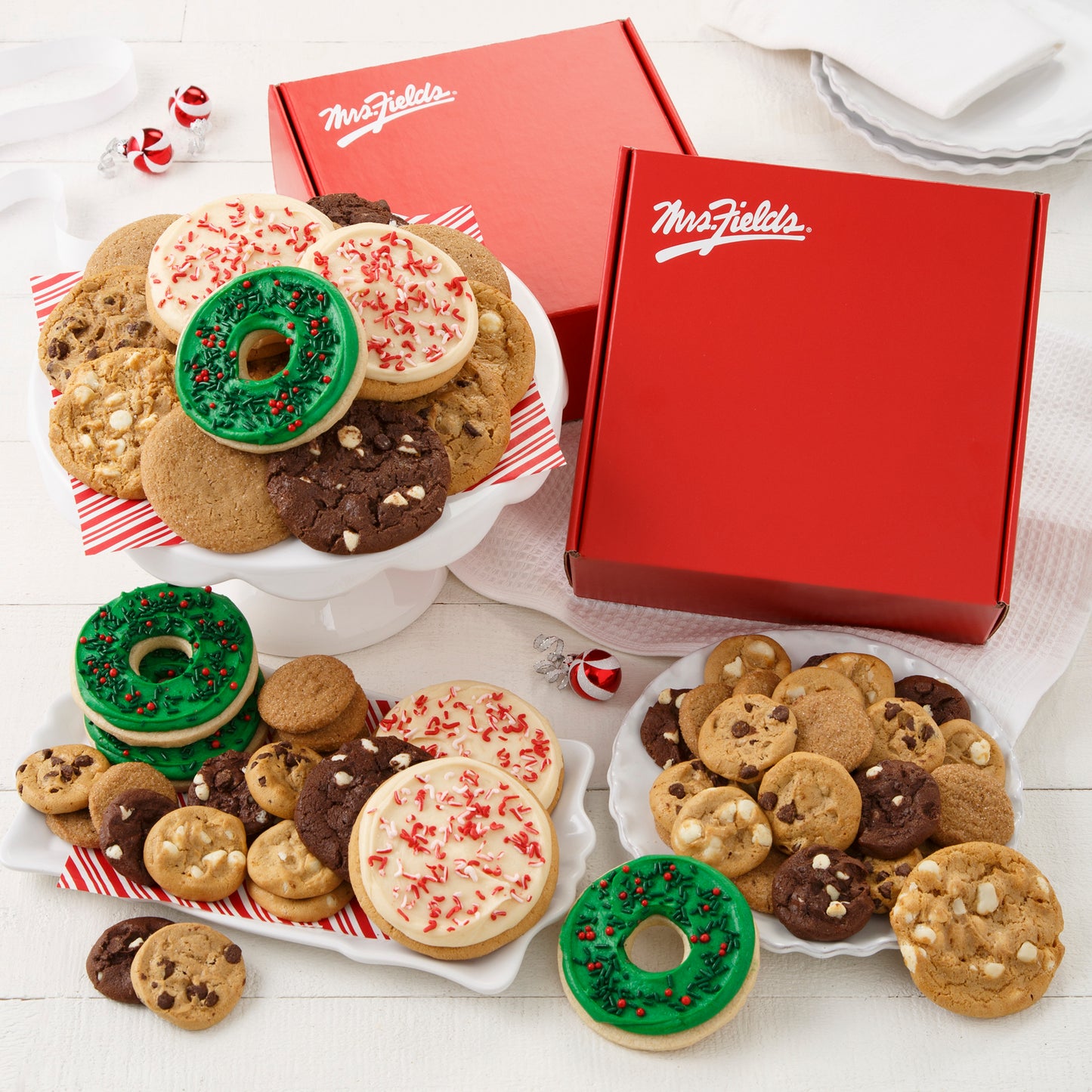 ent of original cookies, Nibblers®, four frosted wreaths with sprinkles, and four peppermint round cookies with sprinkles.