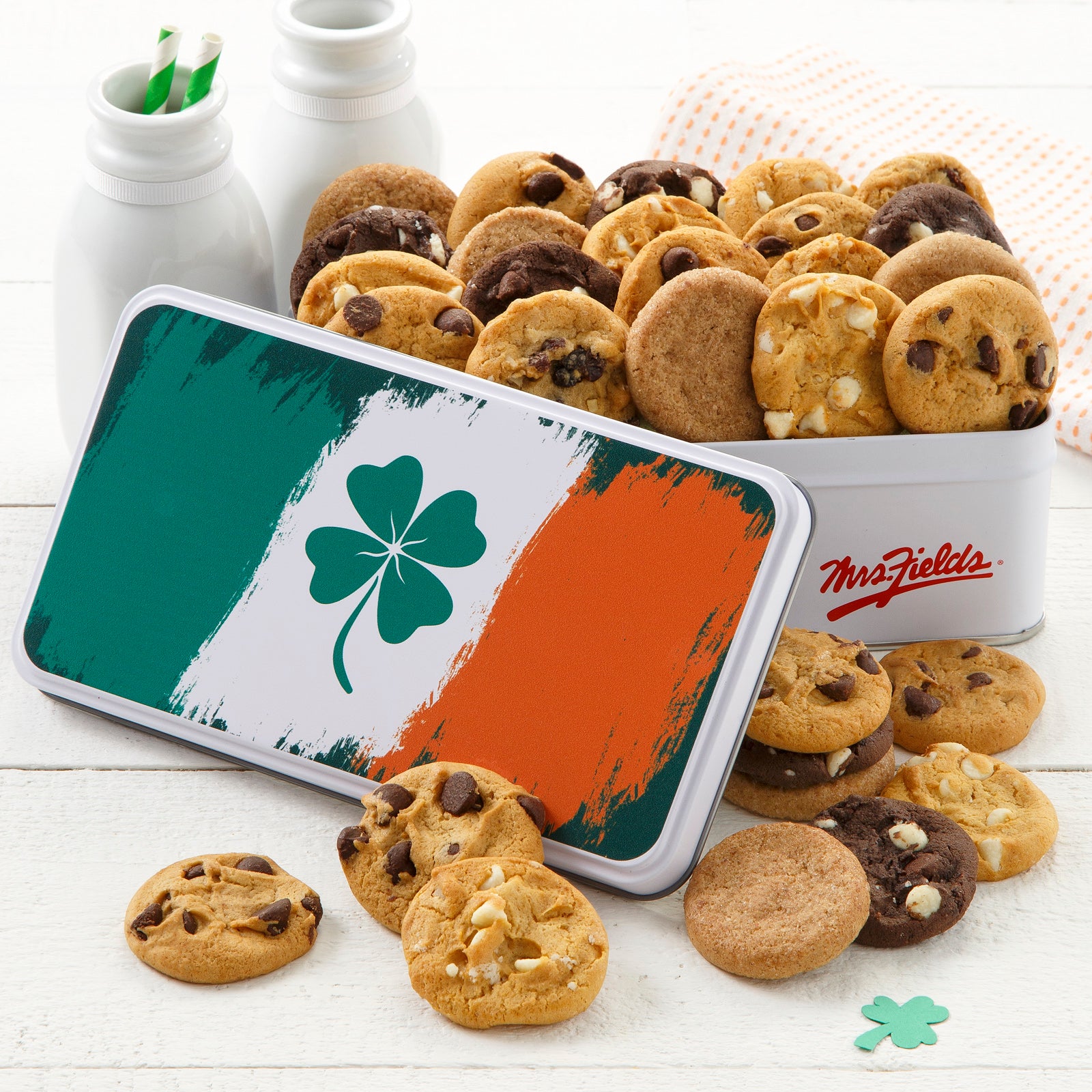 A St. Patrick's Day themed gifted tin with an Irish flag with a four leaf clover and filled with an assortment of nibblers.