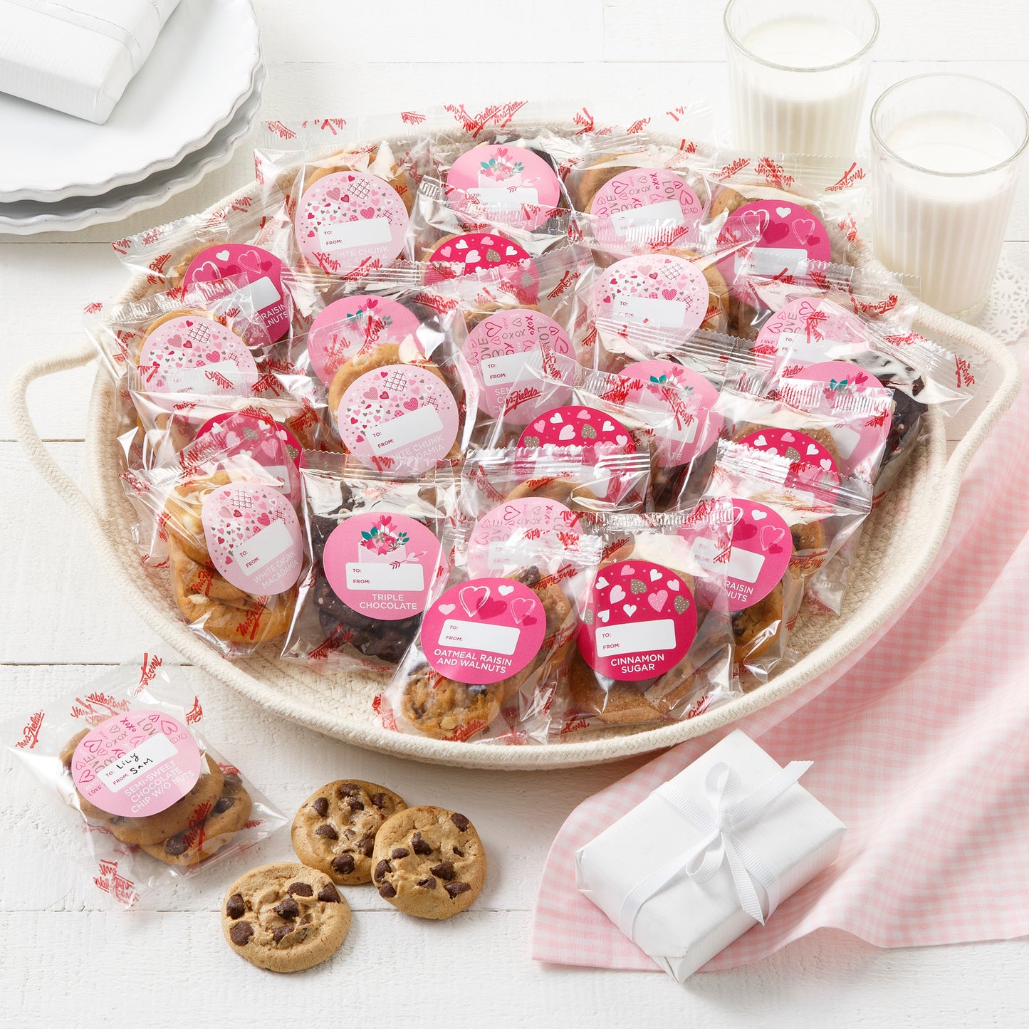 An assortment of packaged nibblers with Valentine's Day themed stickers