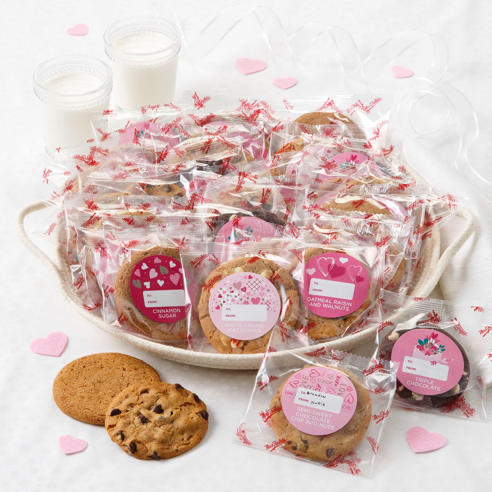 An assortment of packaged original cookies with Valentine's Day themed stickers