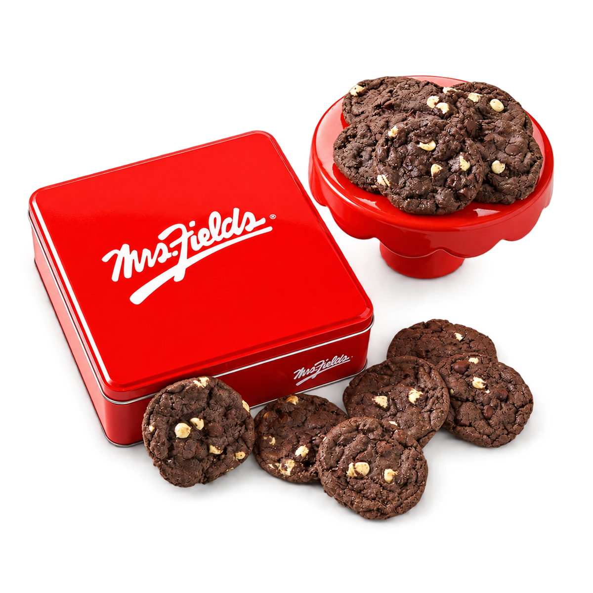 A red square metal tin with the Mrs. Fields logo, shown with several chocolate chip cookies on a white background.